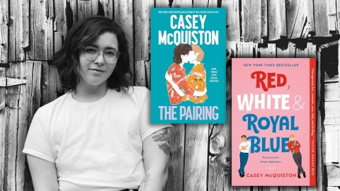 Author Casey McQuiston next to two of her books