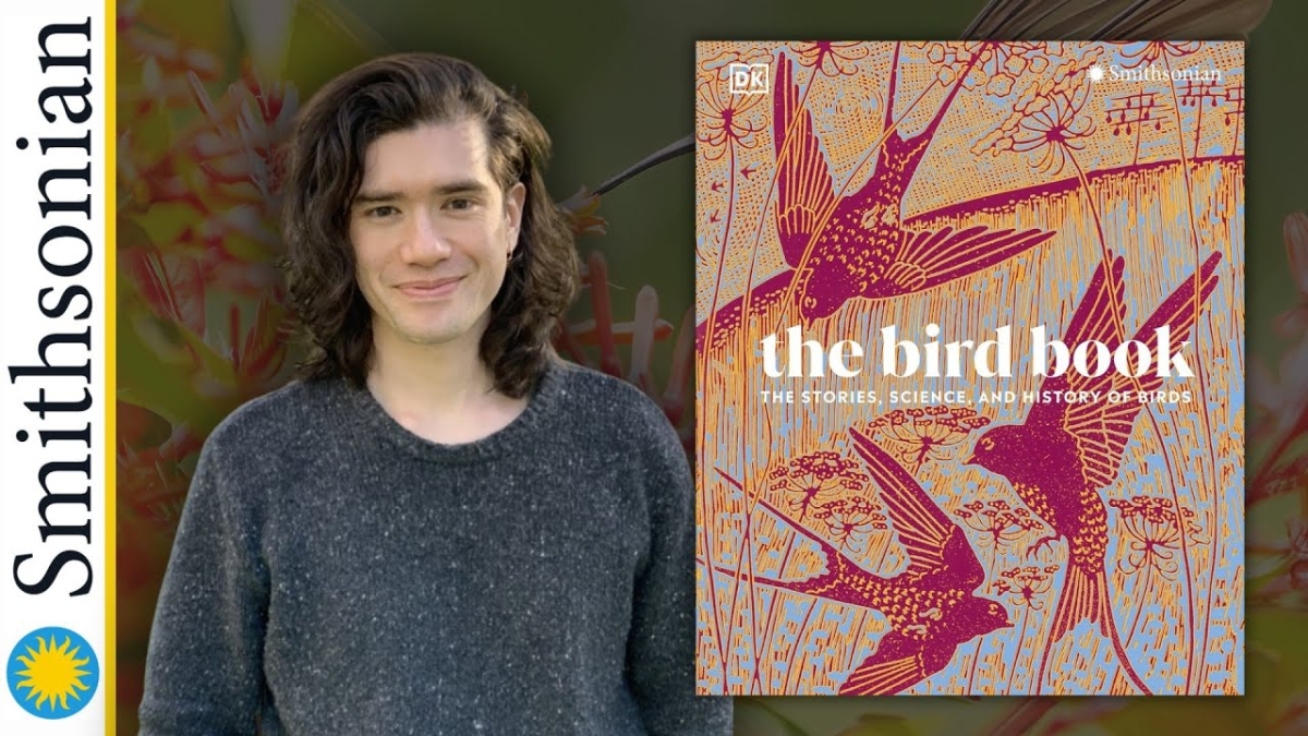 Dr. Jay Jinsing Falk next to his book The Bird Book